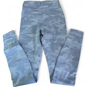 Grey camo lululemon leggings. size 4. one minor flaw. see photo.